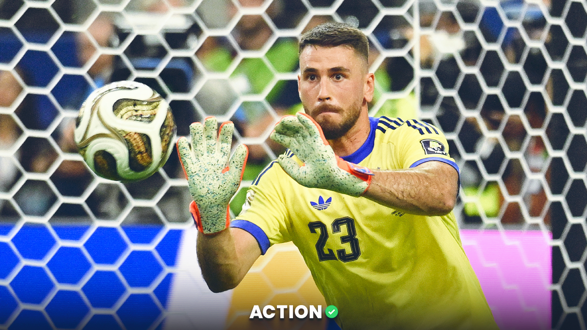 World Cup Golden Glove Odds: Predictions Target Unai Simon, Dibu Martinez article feature image