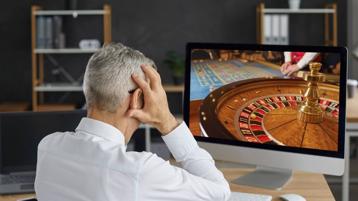 Online bettor reacting to a losing wager on a sportsbook app.