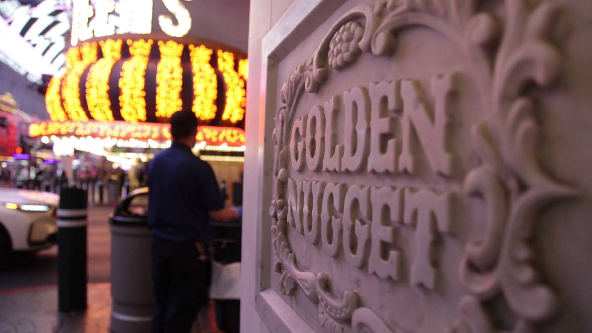 Golden Nugget Casino sign beneath the Fremont Street Experience canopy in downtown Las Vegas