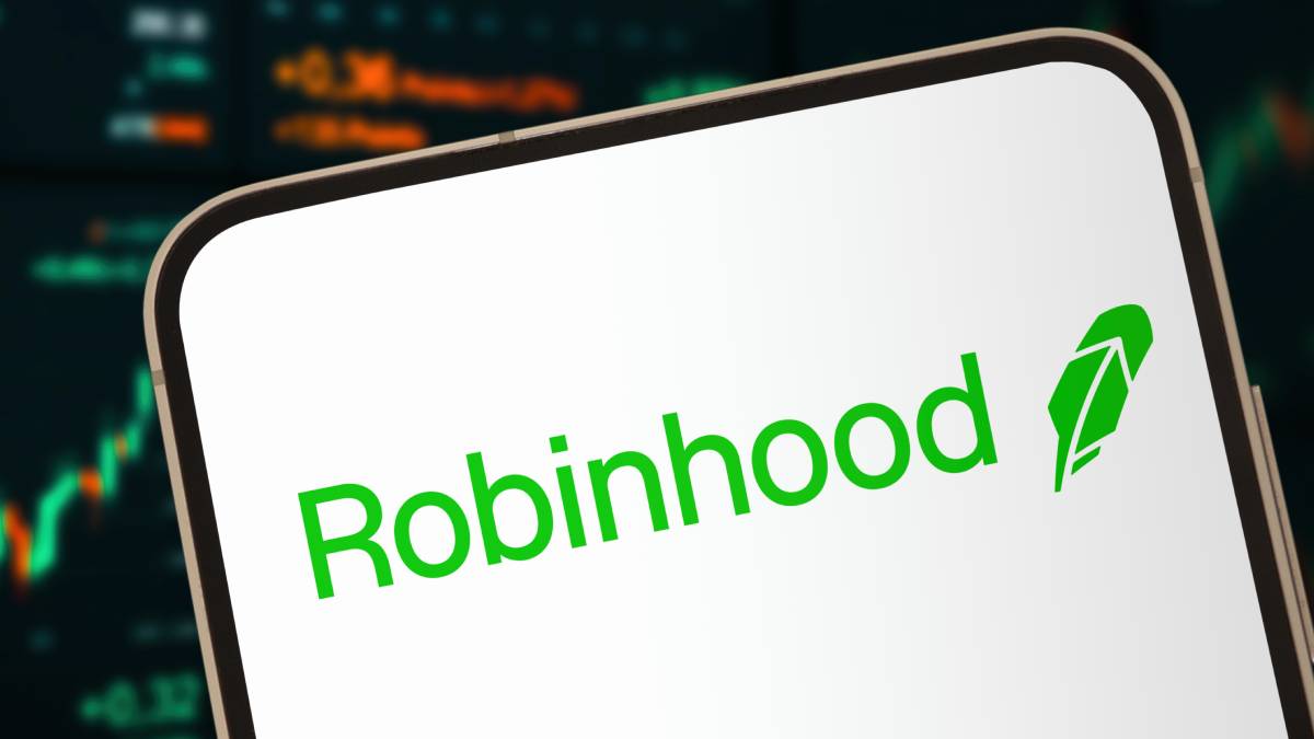 Logos of Robinhood, Crypto.com, and OG.com representing their multi-year prediction markets partnership